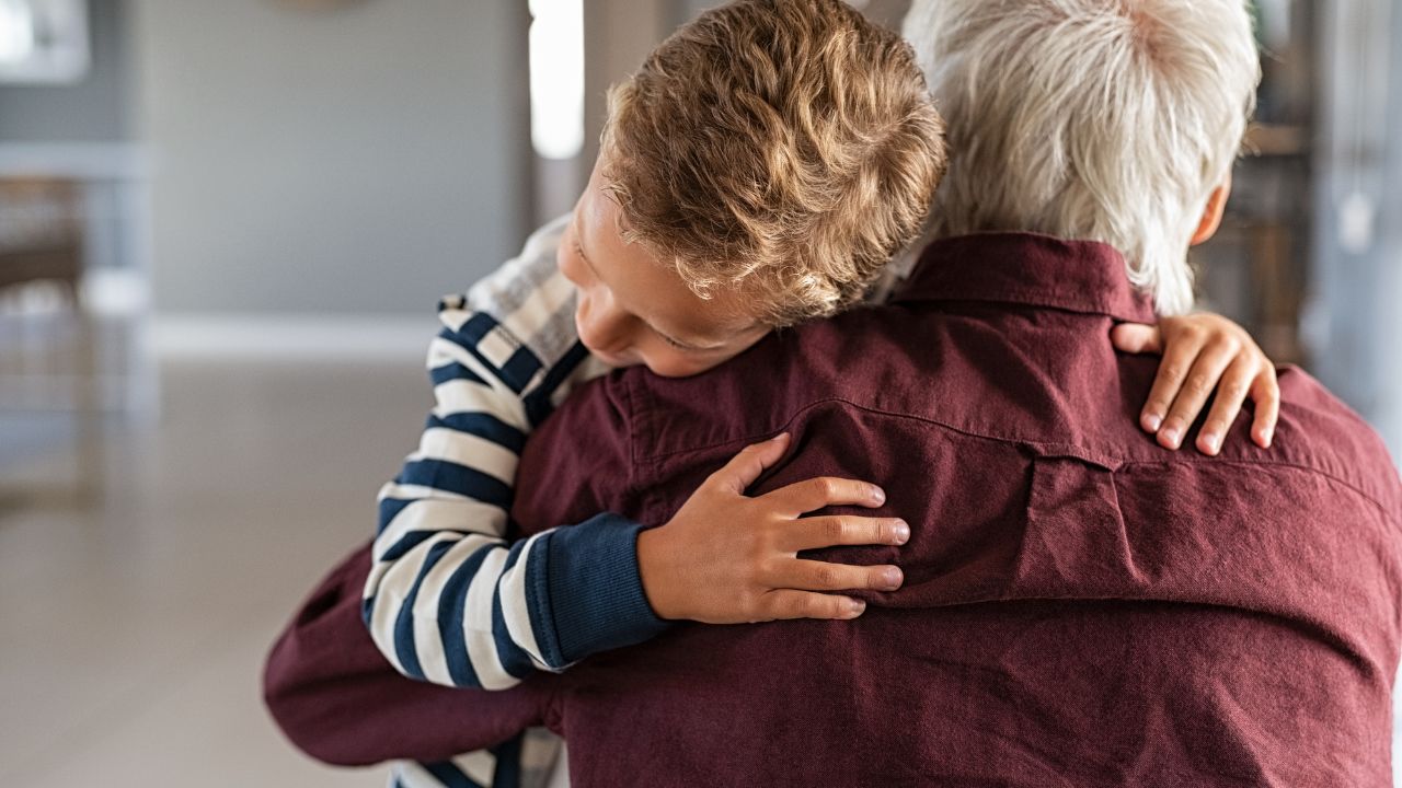 Attached Child Hugging His Grandfather
