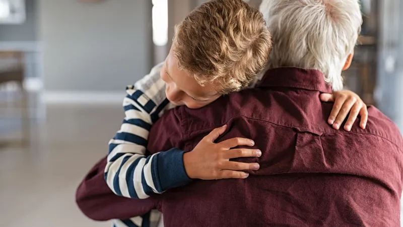 Attached Child Hugging His Grandfather
