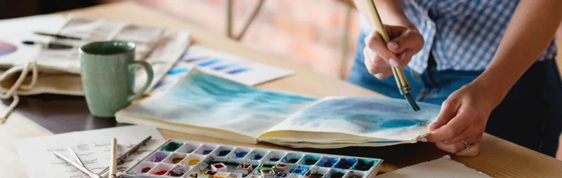 woman-painting_hero_1240x394_20250331