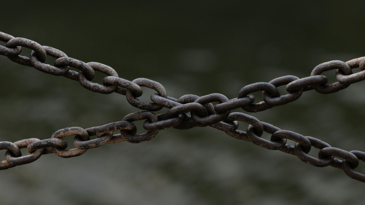 Rusty Chains Over Blurred Background