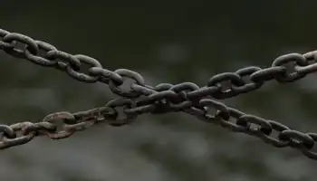 Rusty Chains Over Blurred Background